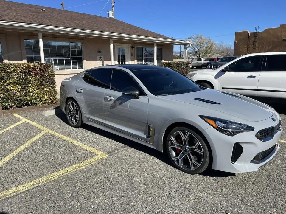 2021 Kia Stinger window tint: Removed all old faded tint, 15% Ceramic front doors, 5% Ceramic rear doors, 5% sunstrip @8inch (view 2)