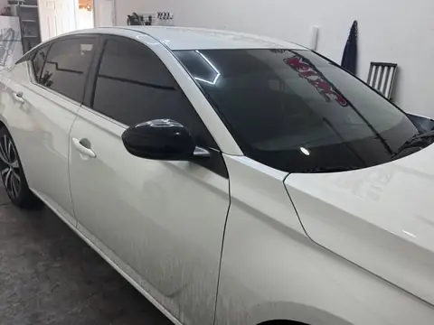 2021 Nissan Altima window tint: 15% Carbon Ceramic sides and rear, 3% Sun Strip