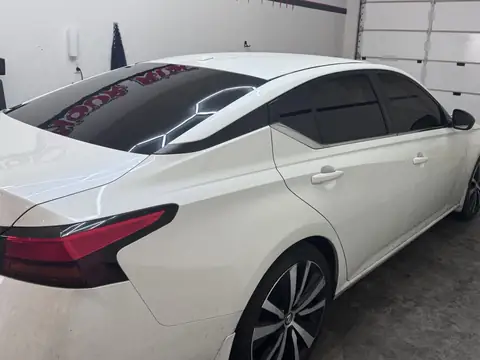 2021 Nissan Altima window tint: 15% Carbon Ceramic sides and rear, 3% Sun Strip (view 2)