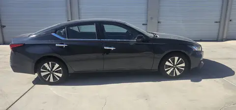 2021 Nissan Altima window tint: 20% Sides & Rear with a 3% Windshield Visor Strip