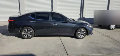 2021 Nissan Altima window tint: 20% Sides & Rear with a 3% Windshield Visor Strip (view 2)