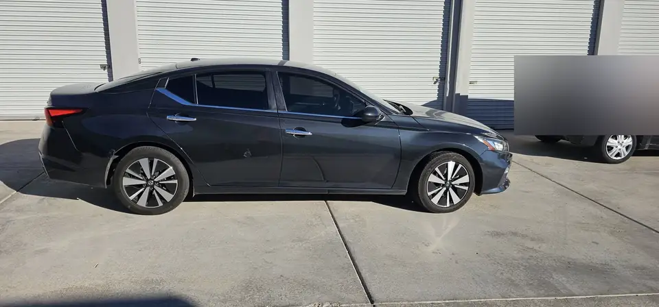 2021 Nissan Altima window tint: 20% Sides & Rear with a 3% Windshield Visor Strip (view 2)