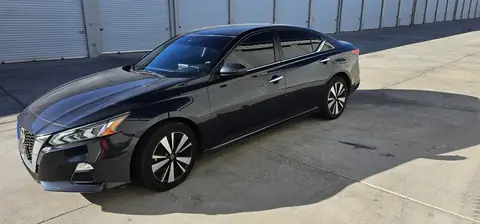 2021 Nissan Altima window tint: 20% Sides & Rear with a 3% Windshield Visor Strip (view 4)