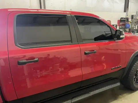 2021 Ram 1500 Rebel window tint: Removed peeling tint from previous installer, Installed premium 5% on front doors (view 2)