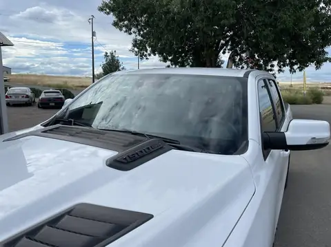 2021 Ram 1500 window tint: 15% Premium Ceramic front doors, 5% 11 inch sunstrip (view 3)