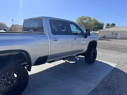2022 Chevy Silverado window tint: Removal on front 2 doors, 5% Carbon Ceramic over rear 3 privacy windows, 3% Carbon Ceramic front doors, 50% Carbon