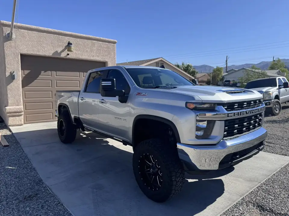 2022 Chevy Silverado window tint: Removal on front 2 doors, 5% Carbon Ceramic over rear 3 privacy windows, 3% Carbon Ceramic front doors, 50% Carbon (view 2)