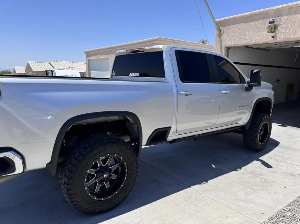 2022 Chevy Silverado window tint: Removal on front 2 doors, 5% Carbon Ceramic over rear 3 privacy windows, 3% Carbon Ceramic front doors, 50% Carbon (view 3)