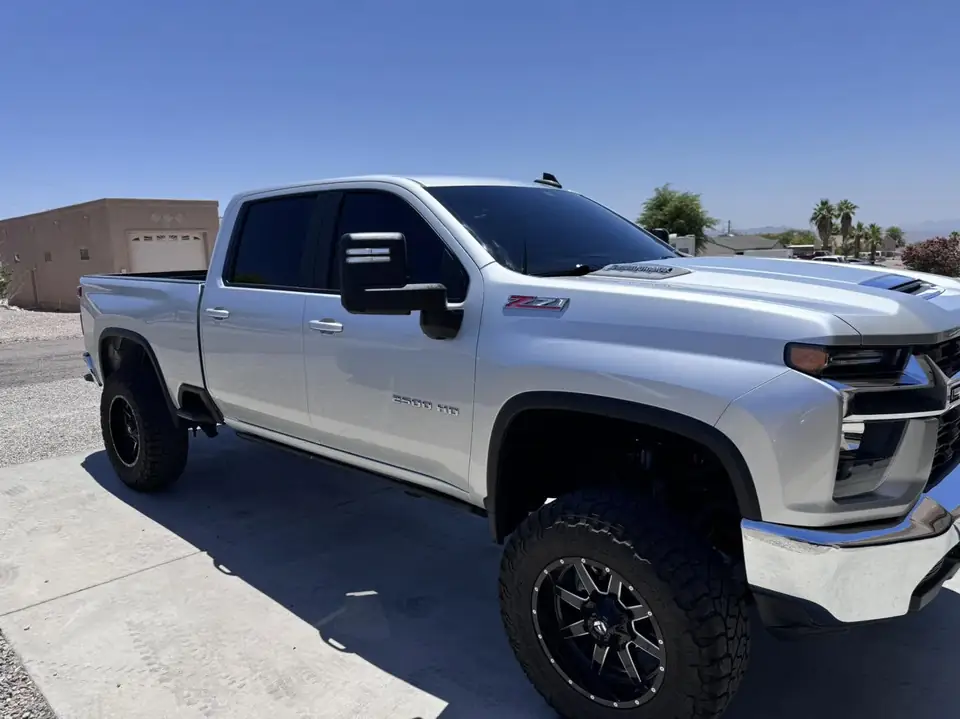 2022 Chevy Silverado window tint: Removal on front 2 doors, 5% Carbon Ceramic over rear 3 privacy windows, 3% Carbon Ceramic front doors, 50% Carbon (view 4)