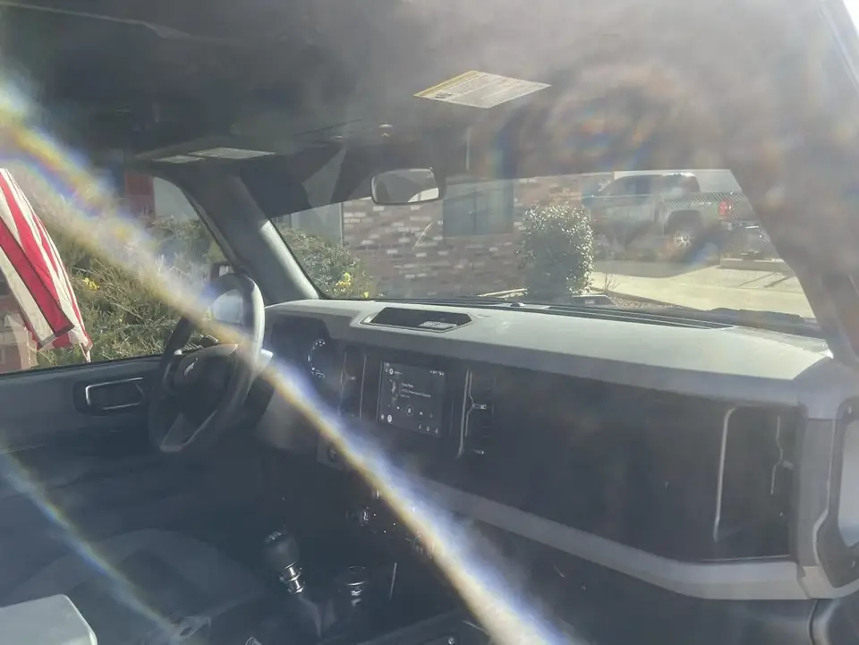 2022 Ford Bronco window tint: Came back in for a layer of 15% over the rear 5% cargo windows, And full windshield done with 35%, 5% sun strip (view 3)