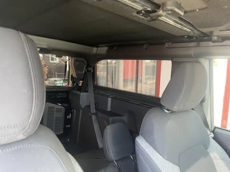 2022 Ford Bronco window tint: Came back in for a layer of 15% over the rear 5% cargo windows, And full windshield done with 35%, 5% sun strip (view 4)