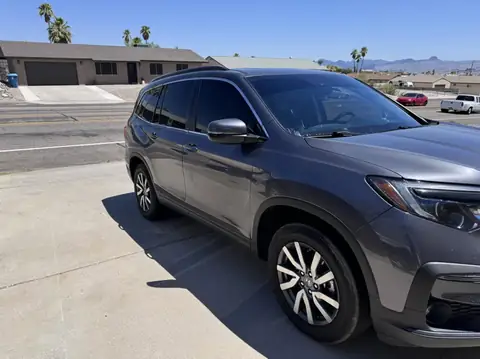 2022 Honda Pilot window tint: 5% Carbon Ceramic rear 5 windows, 20% Carbon Ceramic front doors, 5% sunstrip (view 2)