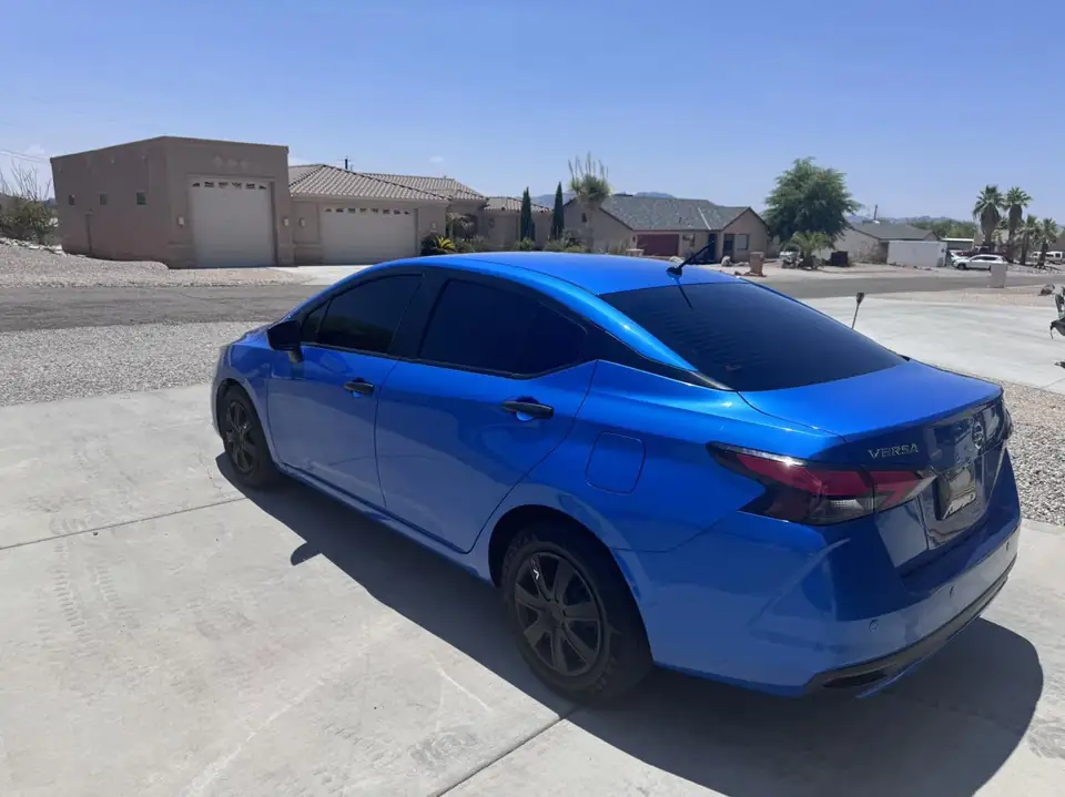 2022 Nissan Versa window tint: 3% Carbon Ceramic doors and rear glass, 50% Carbon Ceramic full windshield, 3% Sun Strip (view 2)