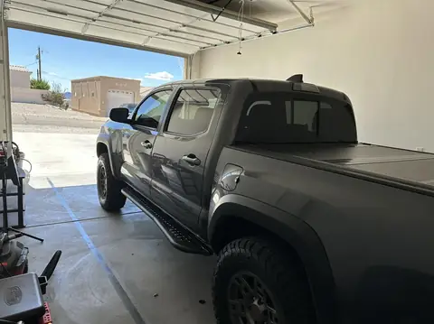 2022 Toyota Tacoma window tint: Full protection package, Removal on 2 front doors, 5% rear 3 windows, 15% front 2 doors, 5% windshield strip