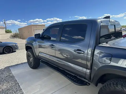 2022 Toyota Tacoma window tint: Full protection package, Removal on 2 front doors, 5% rear 3 windows, 15% front 2 doors, 5% windshield strip (view 3)