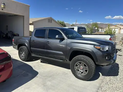 2022 Toyota Tacoma window tint: Full protection package, Removal on 2 front doors, 5% rear 3 windows, 15% front 2 doors, 5% windshield strip (view 4)