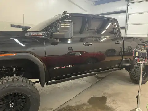 2023 GMC Sierra window tint: 5% ceramic over factory rear glass, 20% ceramic front doors, 20% ceramic windshield
