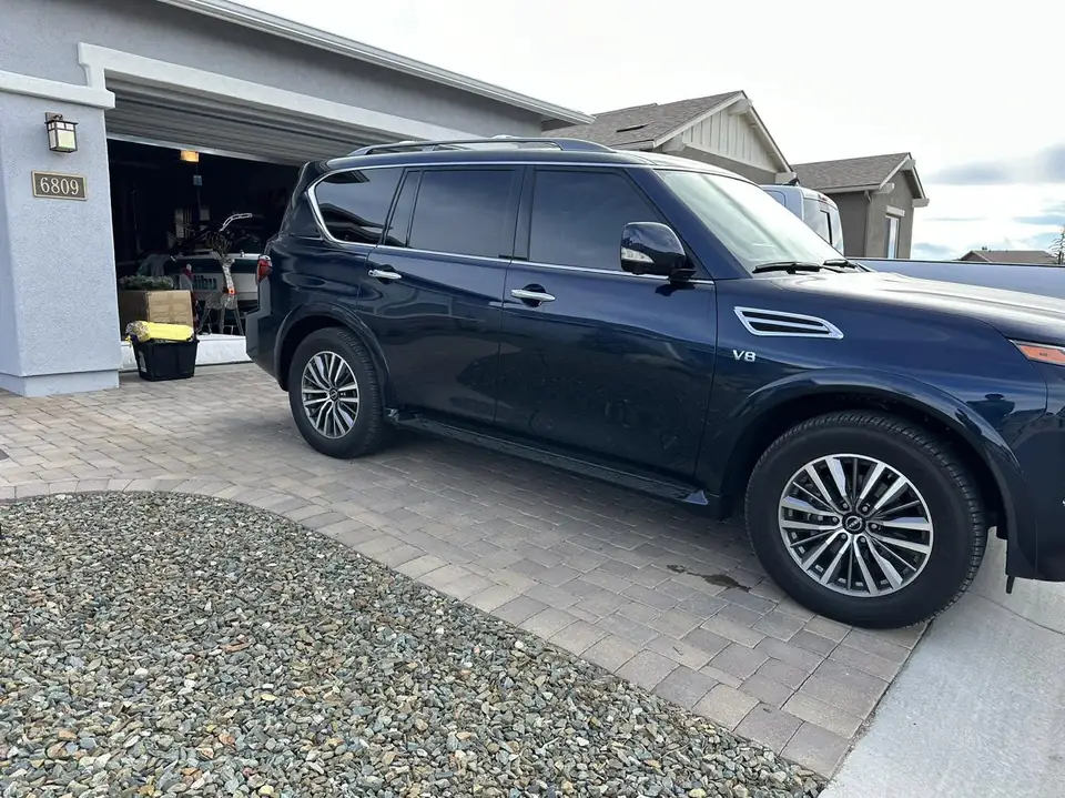 2023 Nissan Armada window tint: 3% over the rear privacy cargo windows, 20% front two windows (view 2)