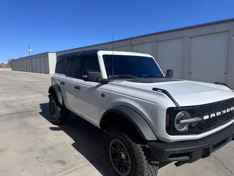 2024 Ford Bronco window tint: Removed film on both front door windows & replaced with 20%, Installed 35% on full windshield (view 2)