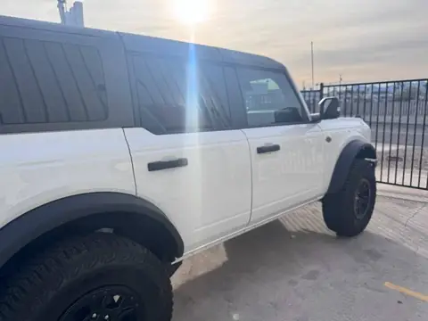 2024 Ford Bronco window tint: Removed film on both front door windows & replaced with 20%, Installed 35% on full windshield (view 3)