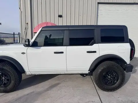 2024 Ford Bronco window tint: Removed film on both front door windows & replaced with 20%, Installed 35% on full windshield (view 5)