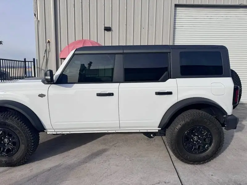 2024 Ford Bronco window tint: Removed film on both front door windows & replaced with 20%, Installed 35% on full windshield (view 5)