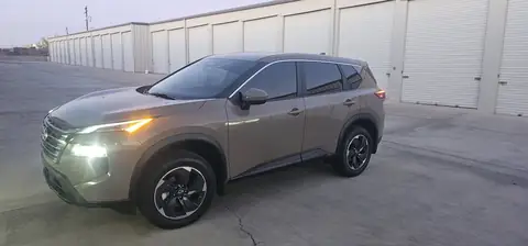 2024 Nissan Rogue window tint: 20% Carbon On Front 2 Windows, 5% Carbon on all Rears, 5% Carbon Visor Strip