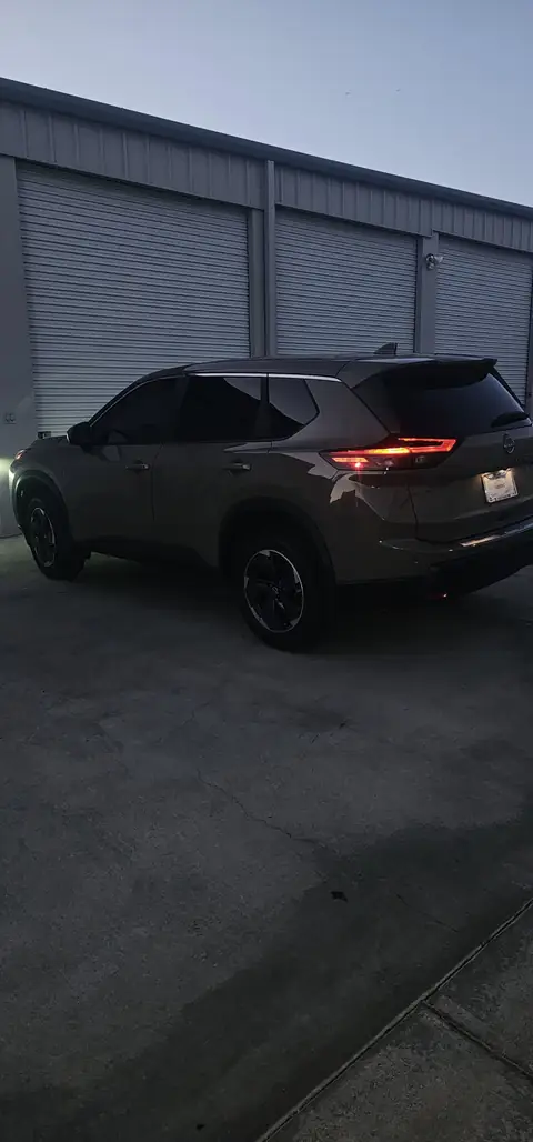 2024 Nissan Rogue window tint: 20% Carbon On Front 2 Windows, 5% Carbon on all Rears, 5% Carbon Visor Strip (view 2)