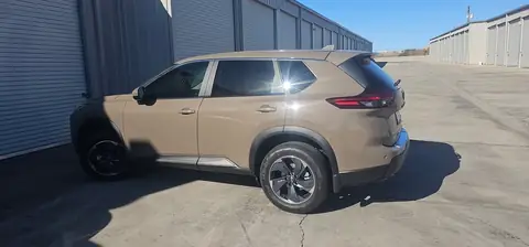 2024 Nissan Rogue window tint: 20% Carbon On Front 2 Windows, 5% Carbon on all Rears, 5% Carbon Visor Strip (view 6)