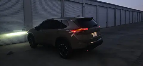2024 Nissan Rogue window tint: 20% Carbon On Front 2 Windows, 5% Carbon on all Rears, 5% Carbon Visor Strip (view 7)