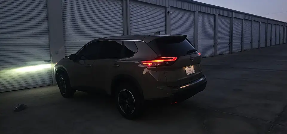 2024 Nissan Rogue window tint: 20% Carbon On Front 2 Windows, 5% Carbon on all Rears, 5% Carbon Visor Strip (view 7)