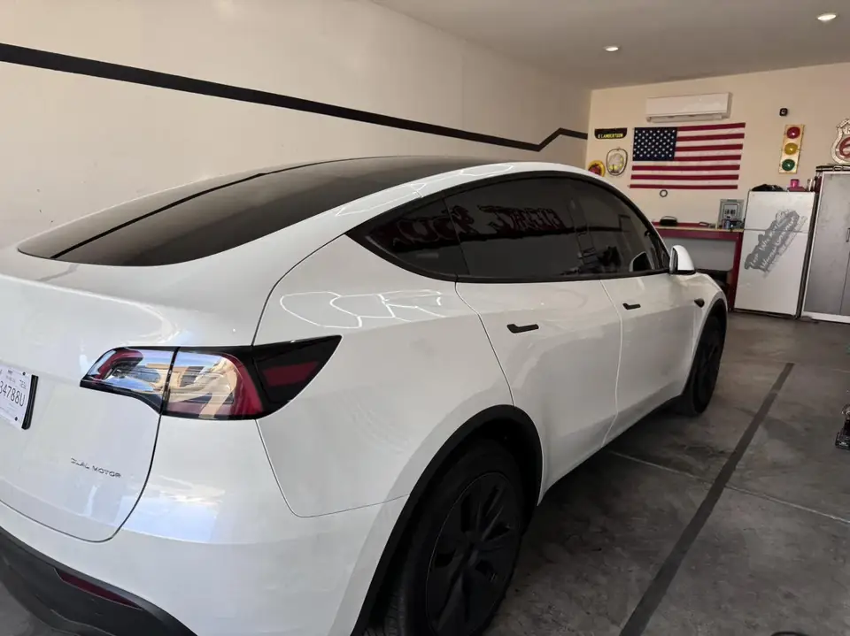2024 Tesla Model Y window tint: 15% Carbon Ceramic sides and rear (view 2)