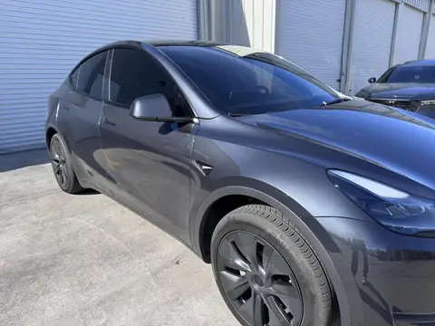 2025 Tesla Model Y window tint: 15% C-IR sides and rear hatch, 50% C-IR full windshield