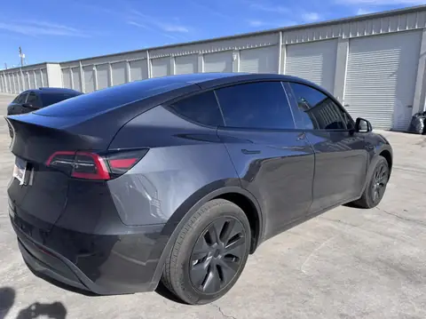 2025 Tesla Model Y window tint: 15% C-IR sides and rear hatch, 50% C-IR full windshield (view 2)