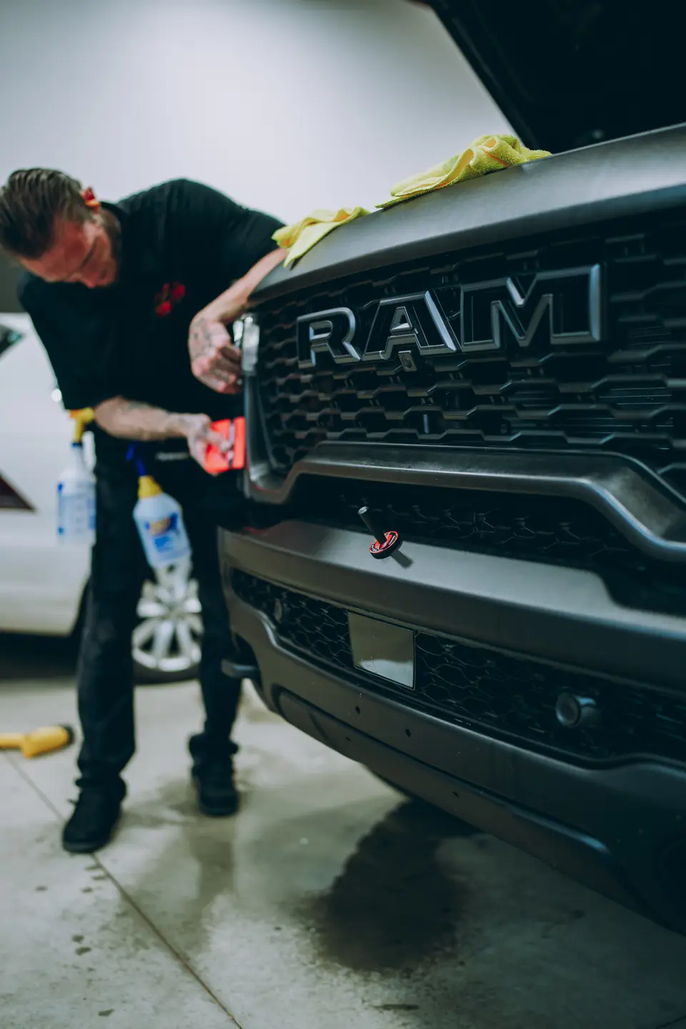 2026 Ram 1500 RHO paint protection film: Stage 2 paint protection film: the front quarter of the hood, the front quarter of both fenders, and the rocker panels front to rear, done at the shop in Prescott Valley (view 7)