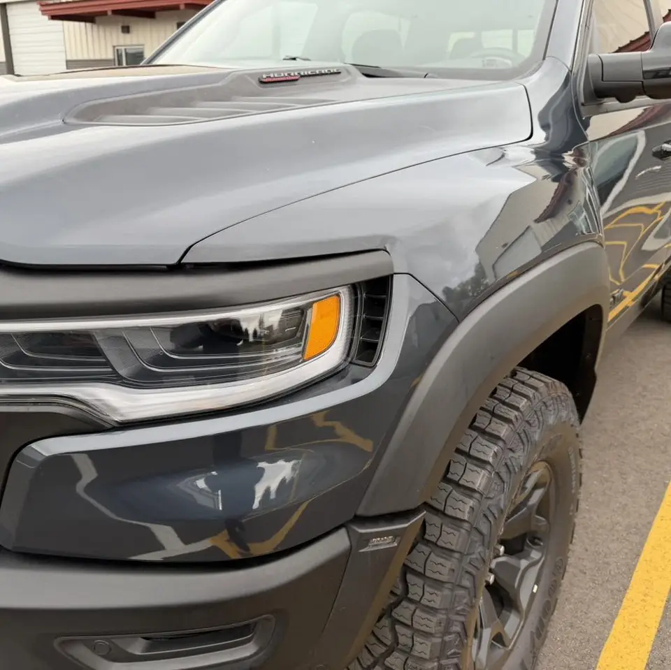 2026 Ram 1500 RHO paint protection film: Stage 2 paint protection film: the front quarter of the hood, the front quarter of both fenders, and the rocker panels front to rear, done at the shop in Prescott Valley (view 12)