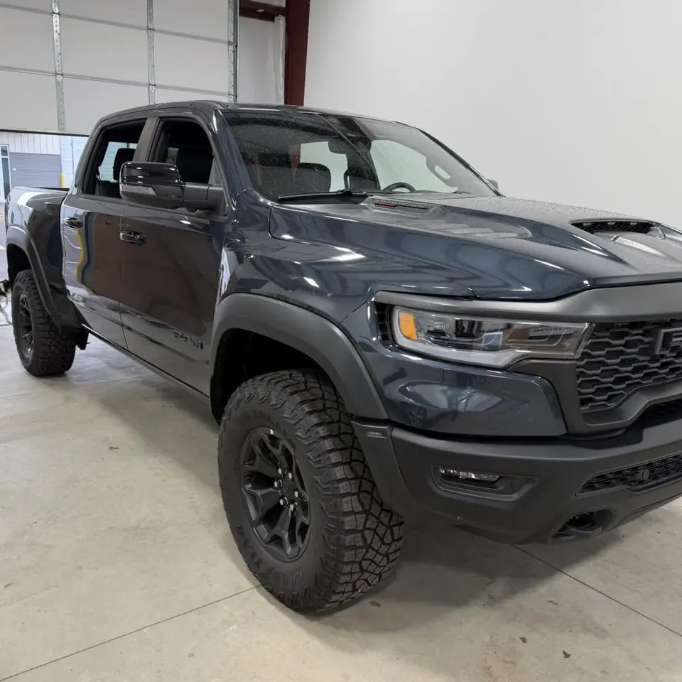 2026 Ram 1500 RHO paint protection film: Stage 2 paint protection film: the front quarter of the hood, the front quarter of both fenders, and the rocker panels front to rear, done at the shop in Prescott Valley (view 14)