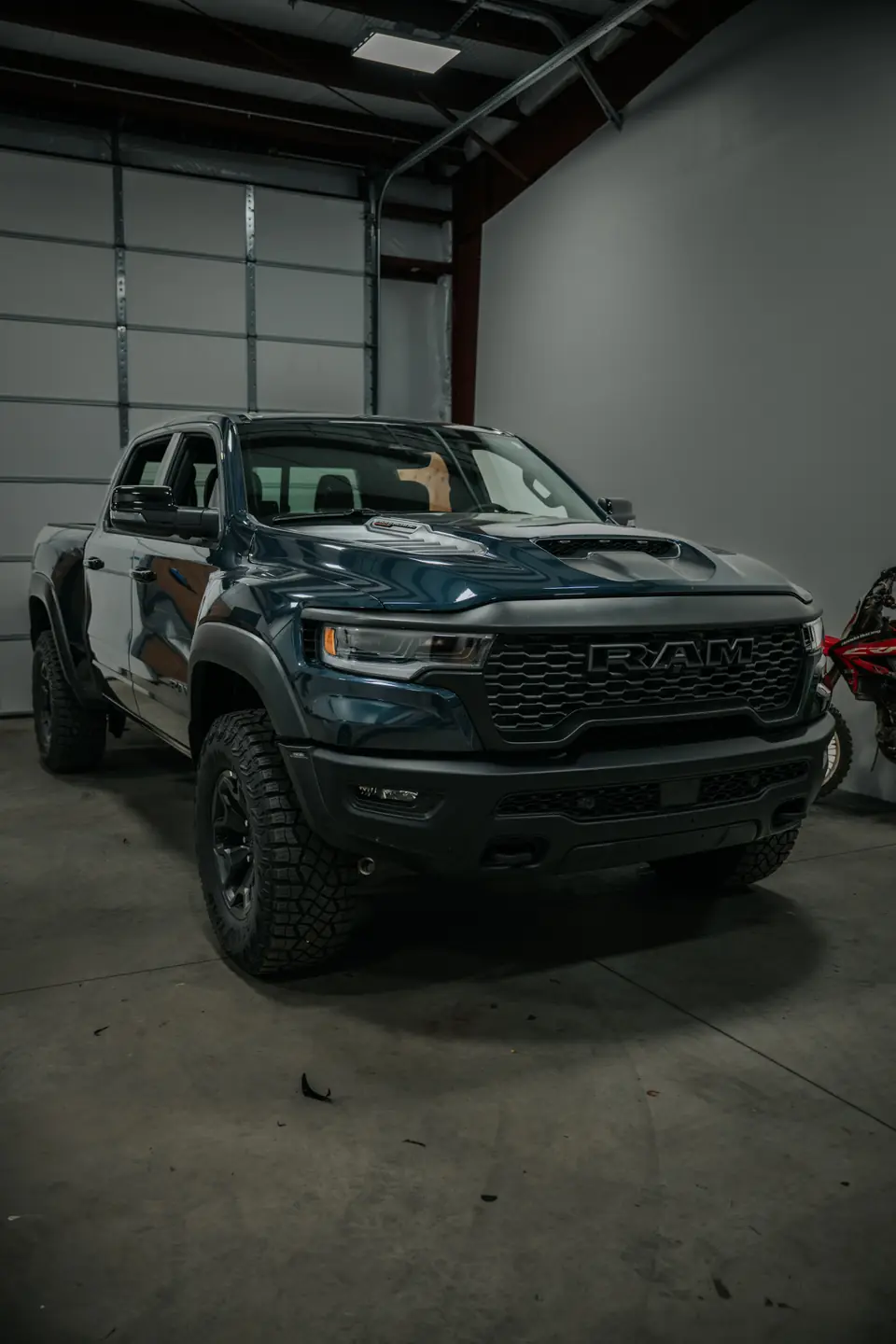 2026 Ram 1500 RHO paint protection film: Stage 2 paint protection film: the front quarter of the hood, the front quarter of both fenders, and the rocker panels front to rear, done at the shop in Prescott Valley (view 15)