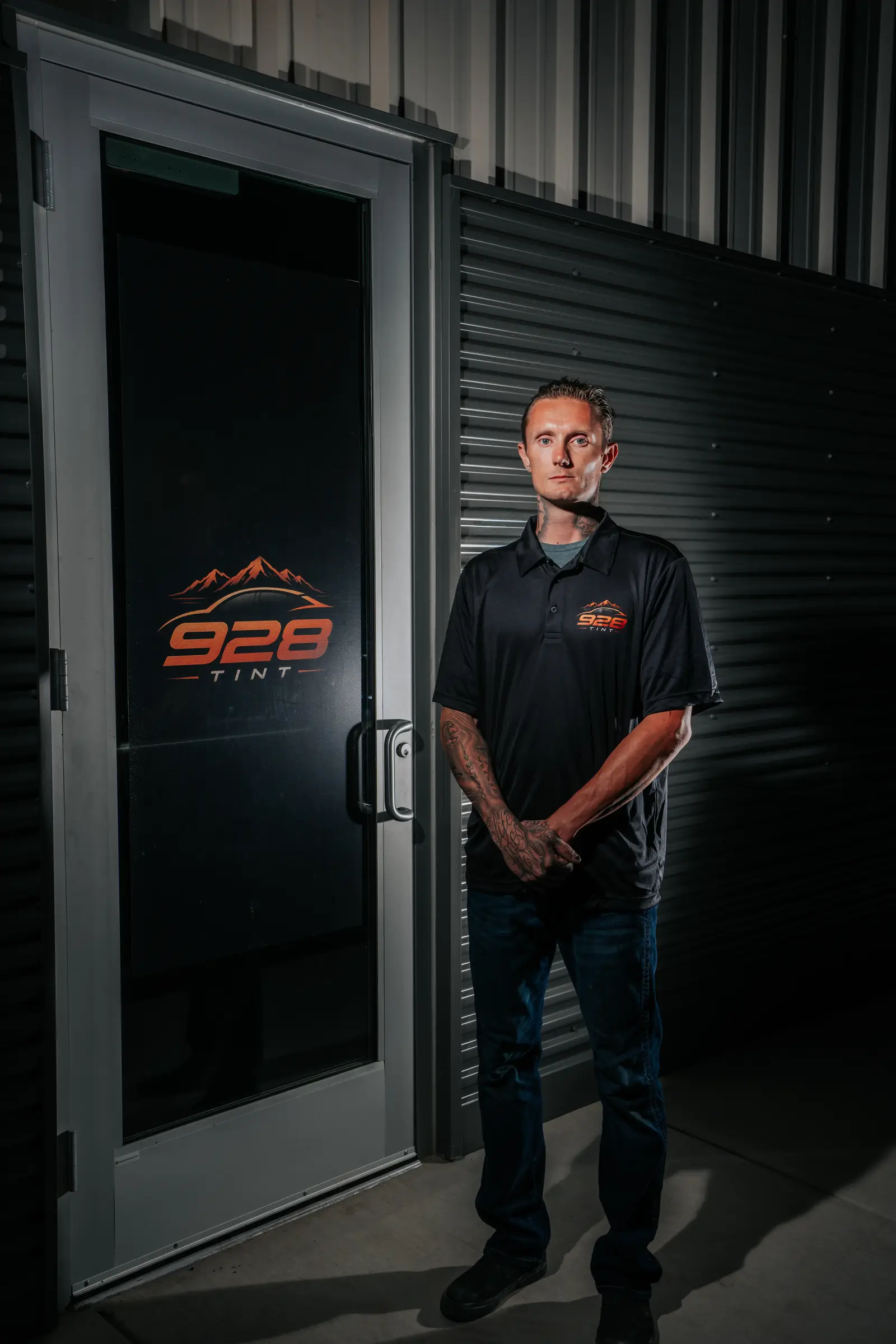 Jonny Martin at the front door of the 928 Tint shop in Prescott Valley