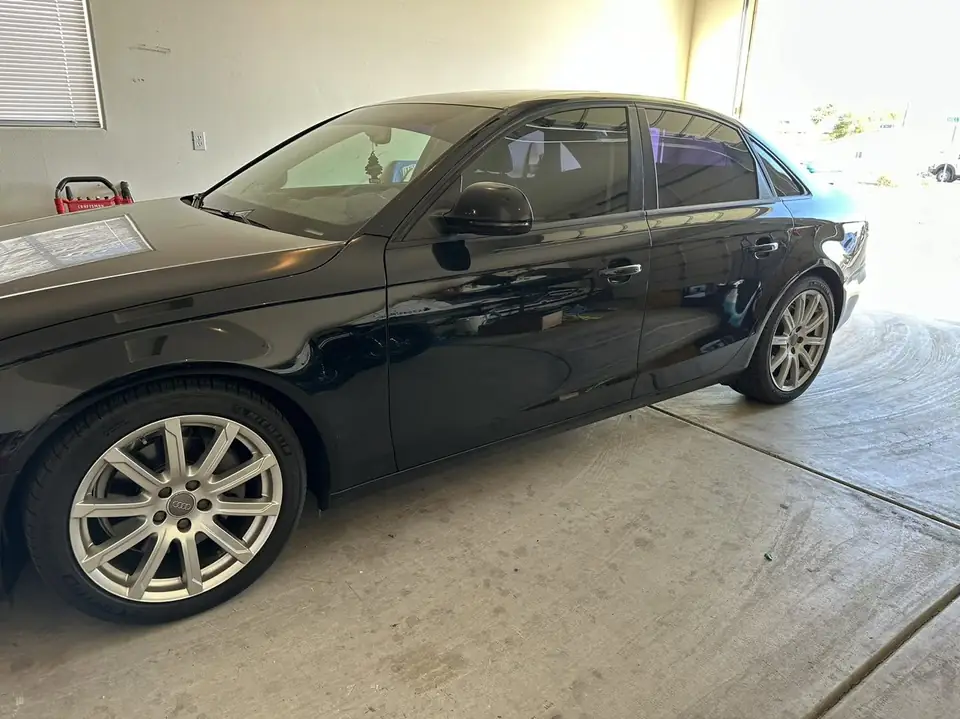 Audi A4 window tint: Remove all old tint, 5% rear doors, quarter windows and back glass, 15% front doors, 5% windshield strip (view 2)