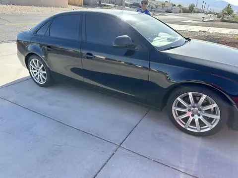 Audi A4 window tint: Remove all old tint, 5% rear doors, quarter windows and back glass, 15% front doors, 5% windshield strip (view 4)