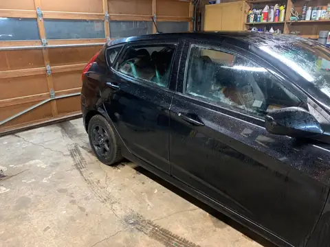 Black hatchback window tint: 5% for rear doors,corner windows and rear hatch, 5% 10inch sun strip (view 2)