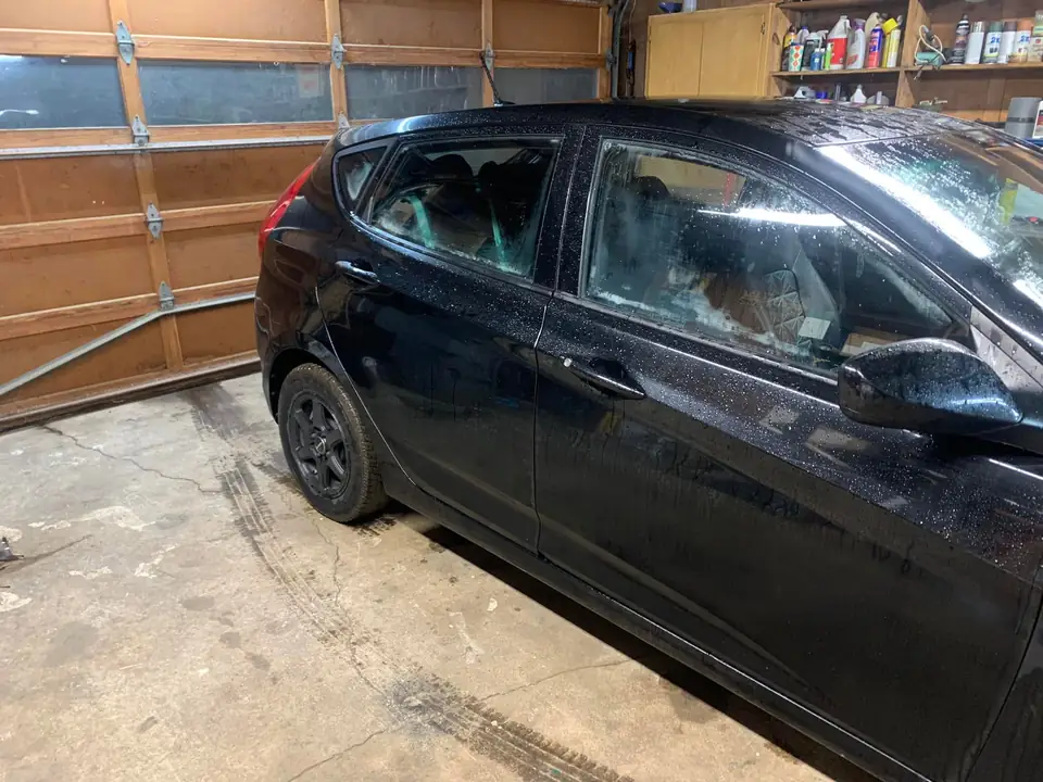 Black hatchback window tint: 5% for rear doors,corner windows and rear hatch, 5% 10inch sun strip (view 2)