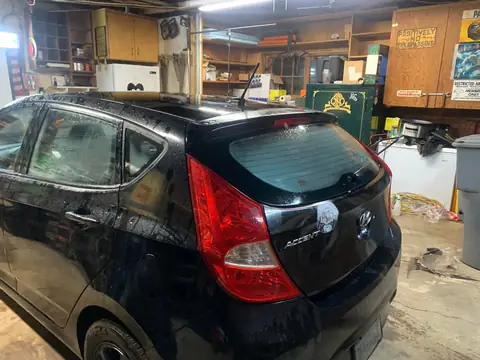 Black hatchback window tint: 5% for rear doors,corner windows and rear hatch, 5% 10inch sun strip (view 3)