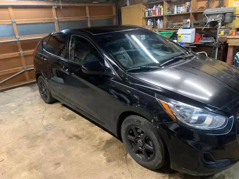Black hatchback window tint: 5% for rear doors,corner windows and rear hatch, 5% 10inch sun strip (view 5)