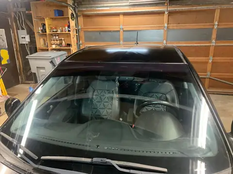 Black hatchback window tint: 5% for rear doors,corner windows and rear hatch, 5% 10inch sun strip (view 7)