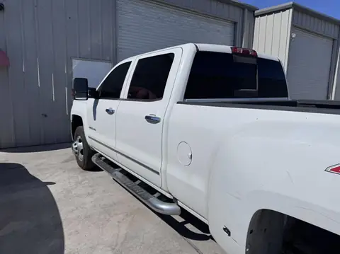 Chevy 3500HD window tint: 15% Ceramic sides and rear window, 50% Ceramic full windshield (view 2)