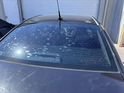 Chevy Cruze window tint: Removal on rear glass and rear door pockets, 5% rear half, 15% front doors