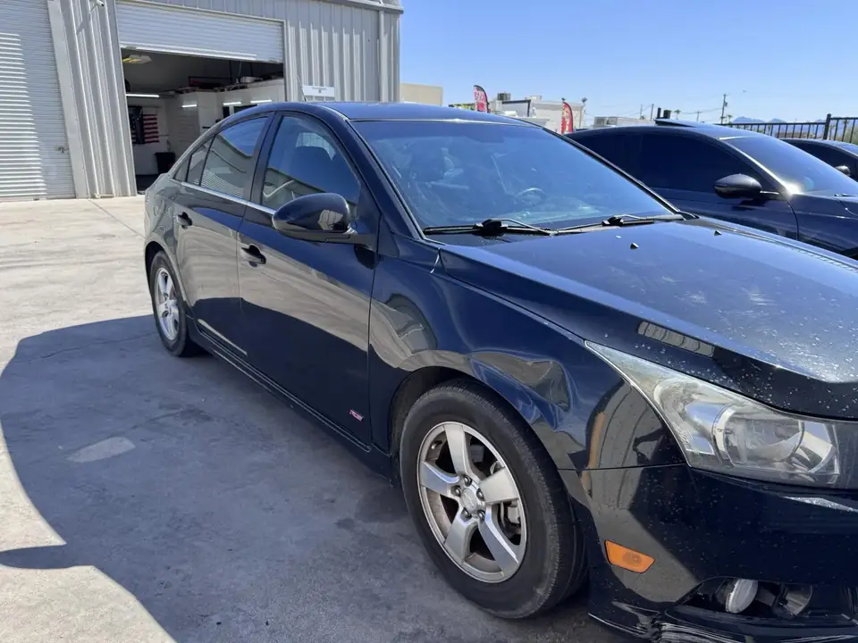 Chevy Cruze window tint: Removal on rear glass and rear door pockets, 5% rear half, 15% front doors (view 3)