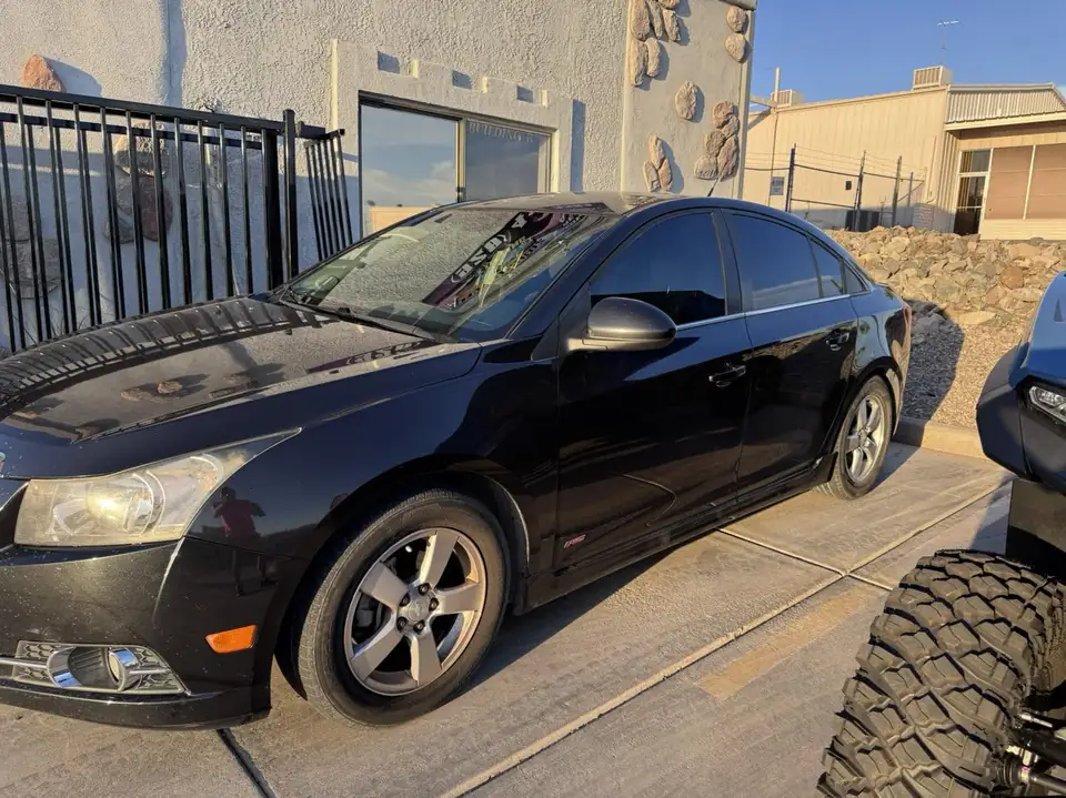 Chevy Cruze window tint: Removal on rear glass and rear door pockets, 5% rear half, 15% front doors (view 4)